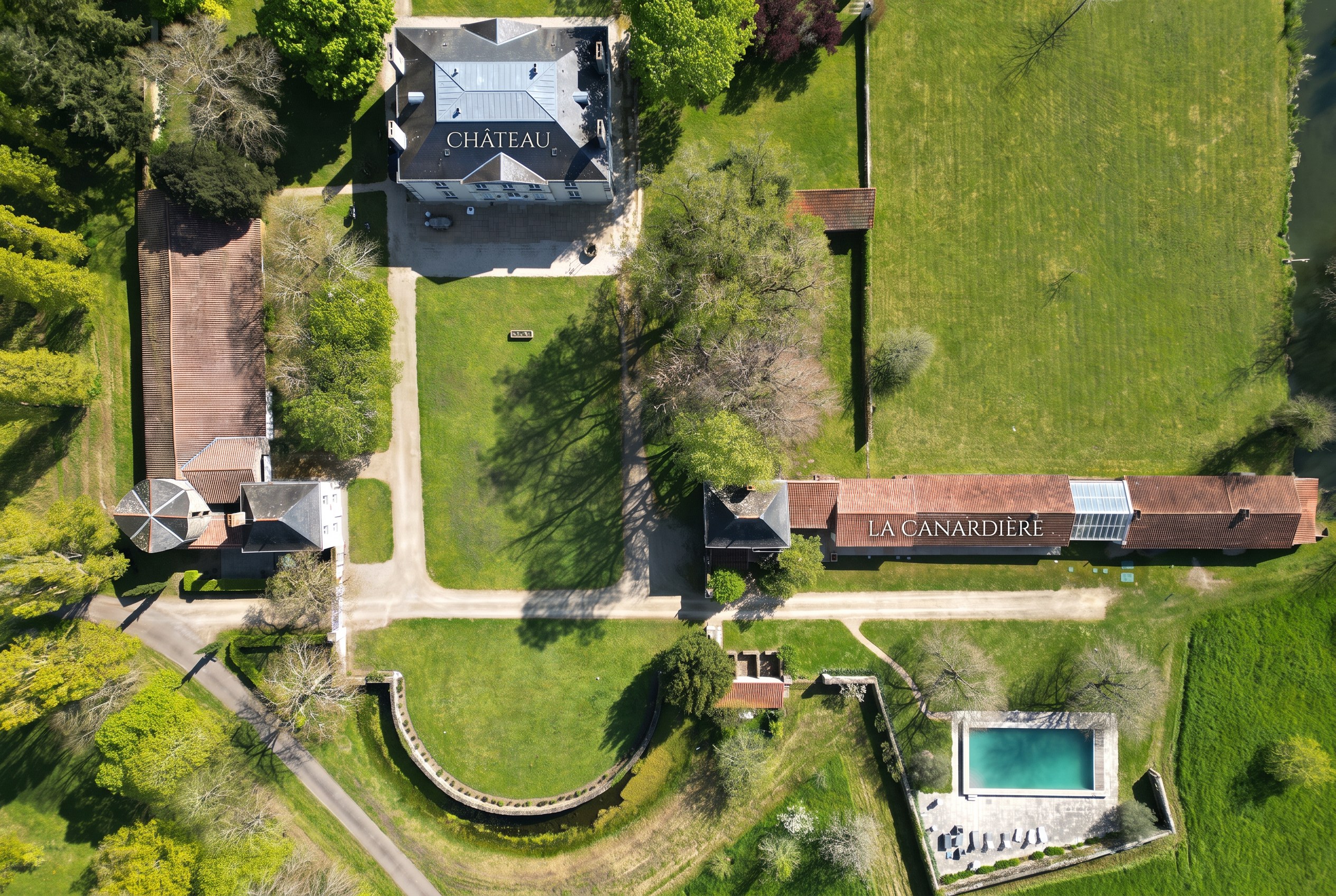 The estate from above — the château, La Canardière and the pool