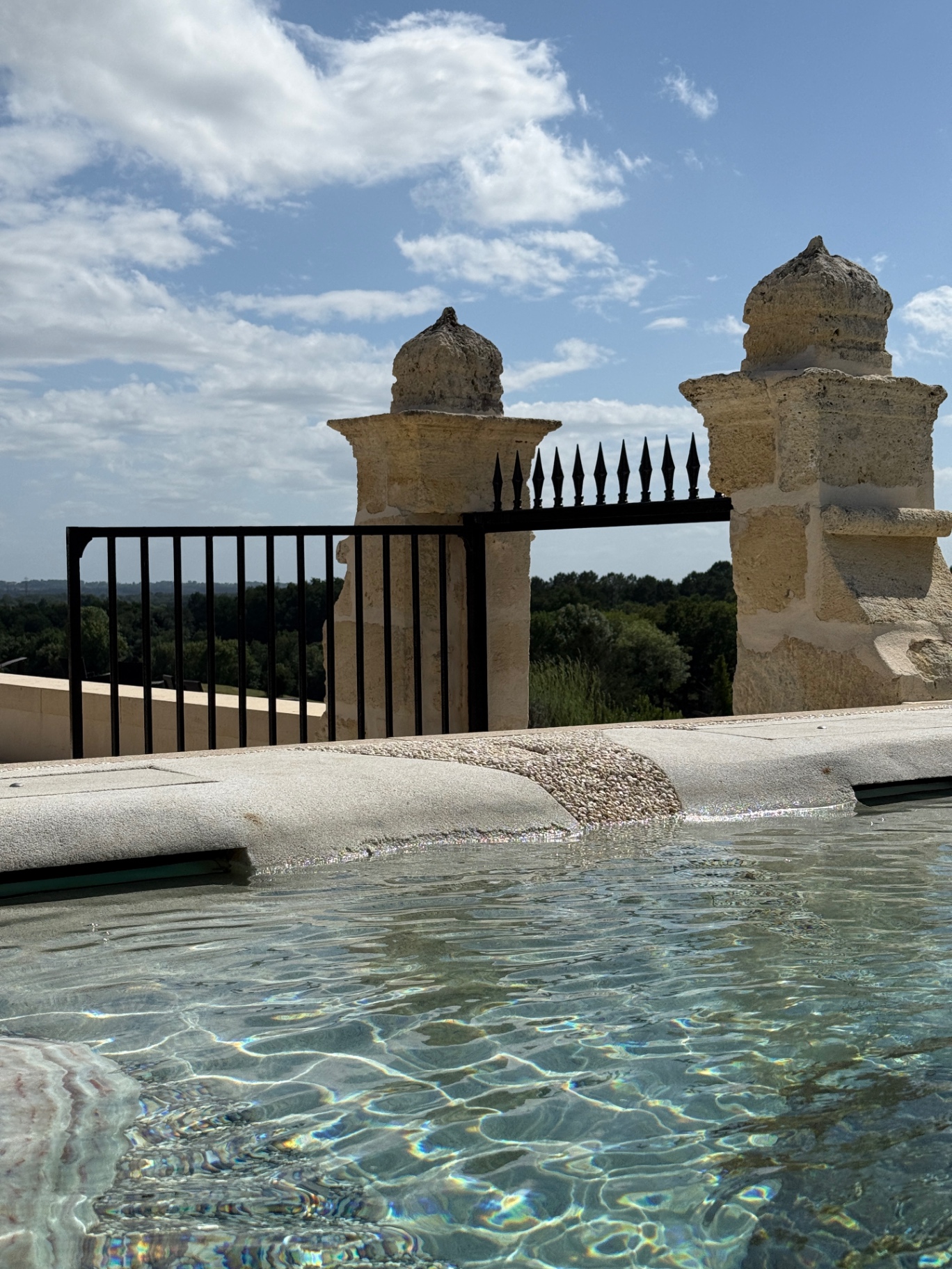 Pool with 18th-century stone gate pillars