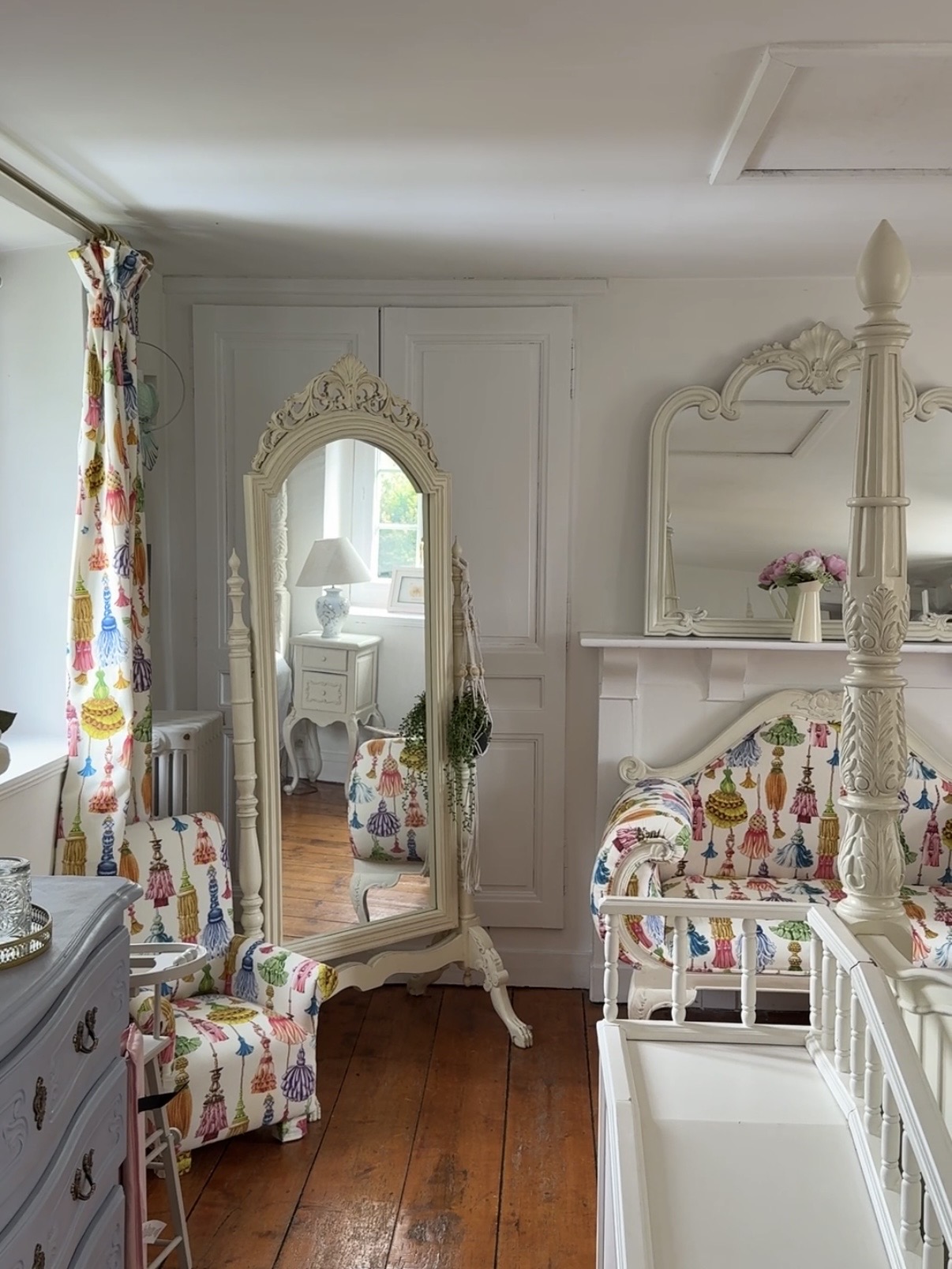 The tassel-print room with its cheval mirror